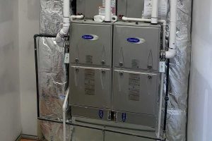 Dual Carrier furnaces installed in a mechanical room